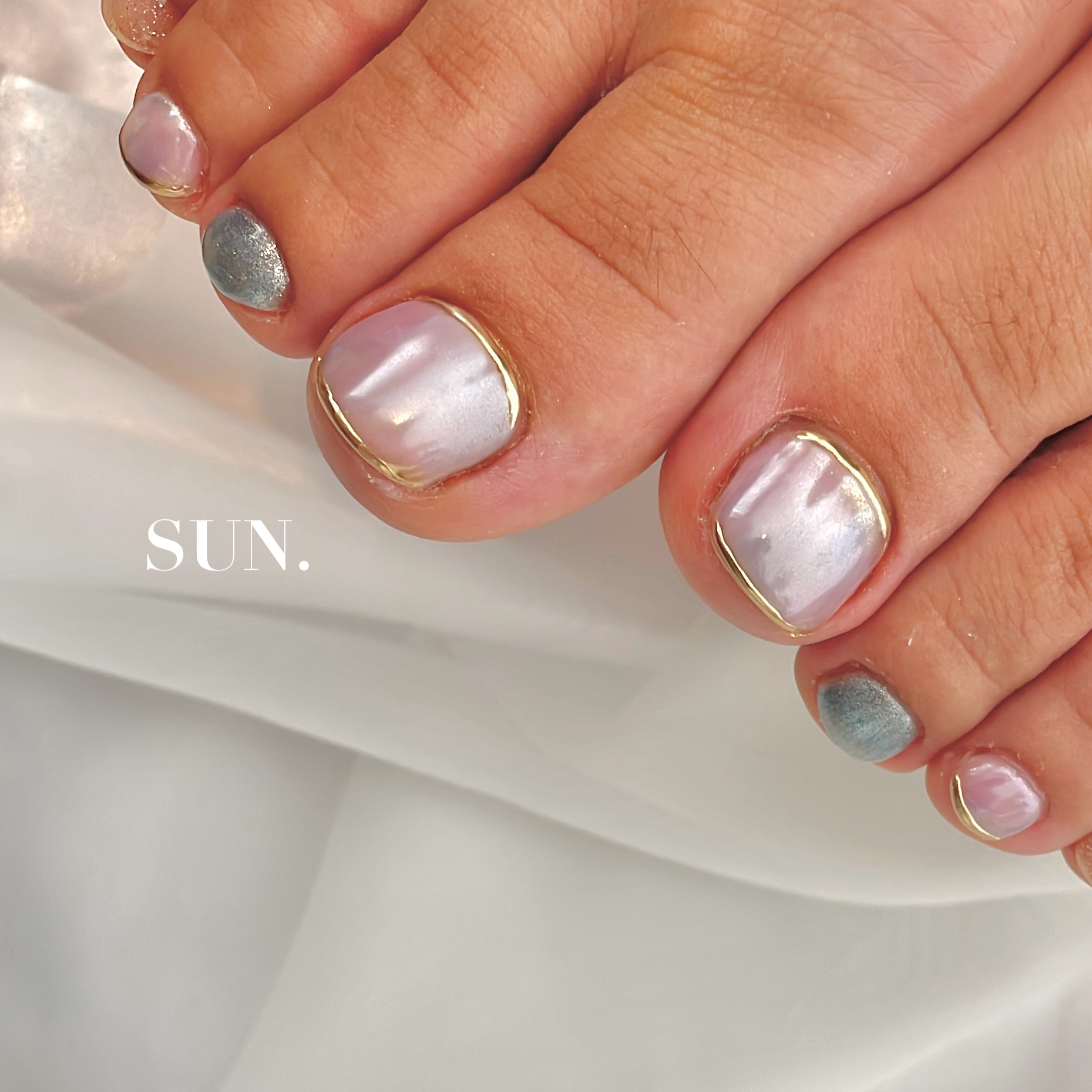 SUN.NAIL