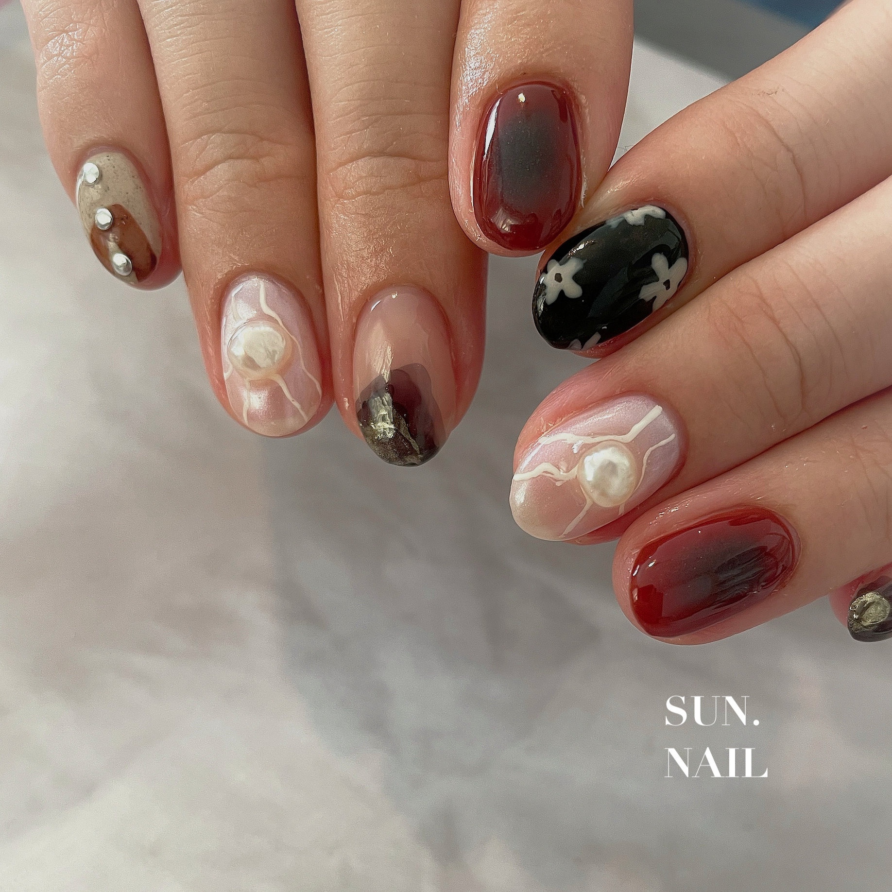 SUN.NAIL